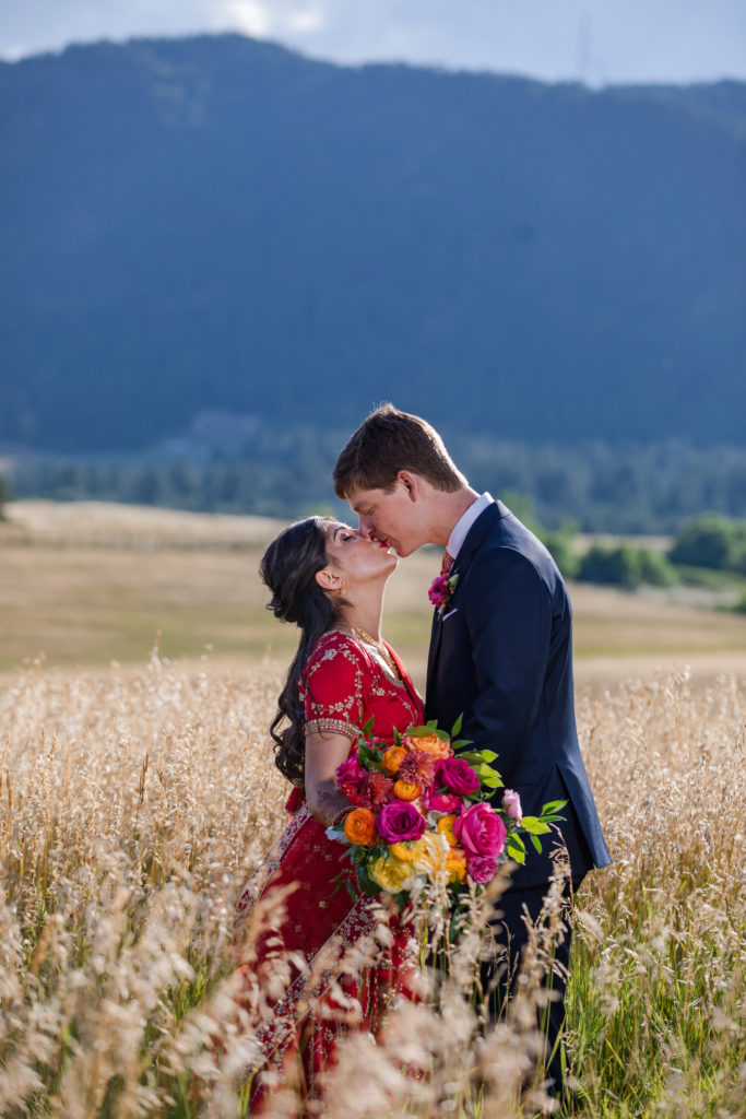 Colorado couple kiss at summer wedding