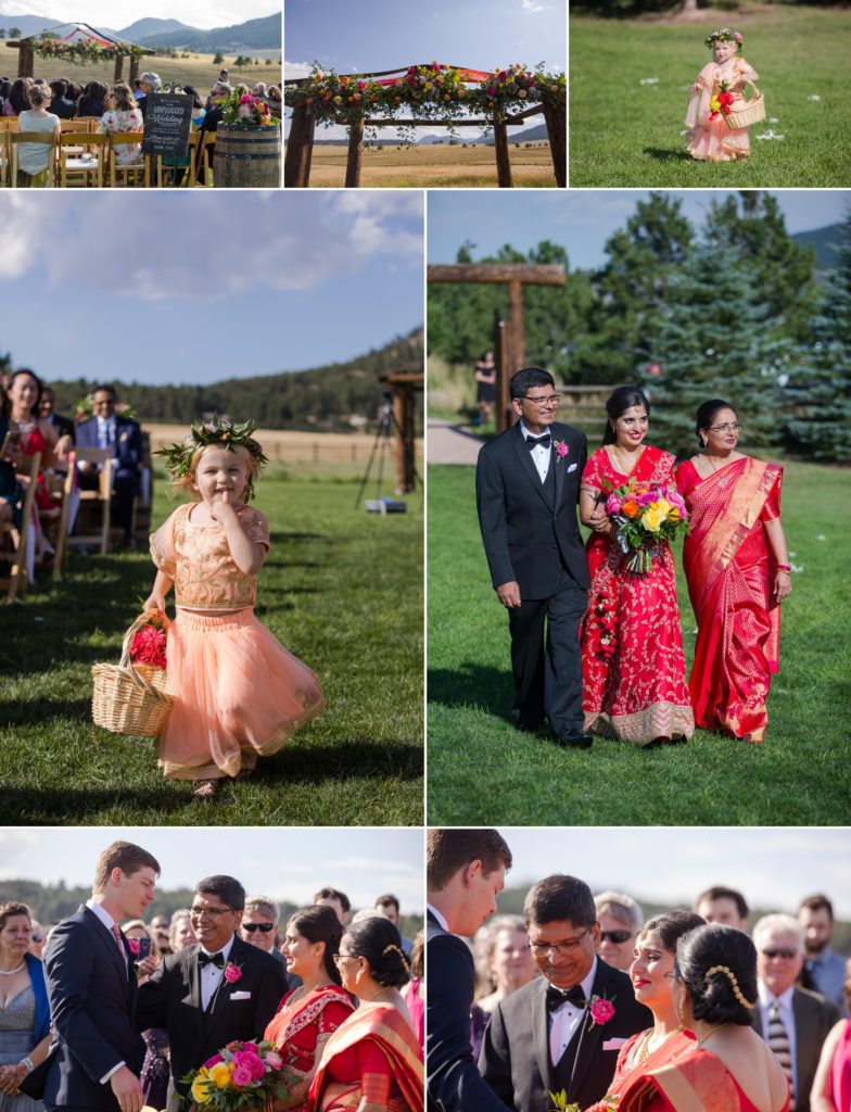 Flower girl walks down aisle at Traditional Indian wedding