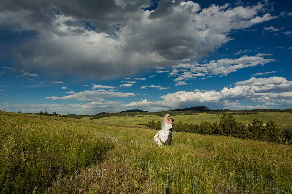Classic newlyweds at summer Spruce Mountain Ranch weddings