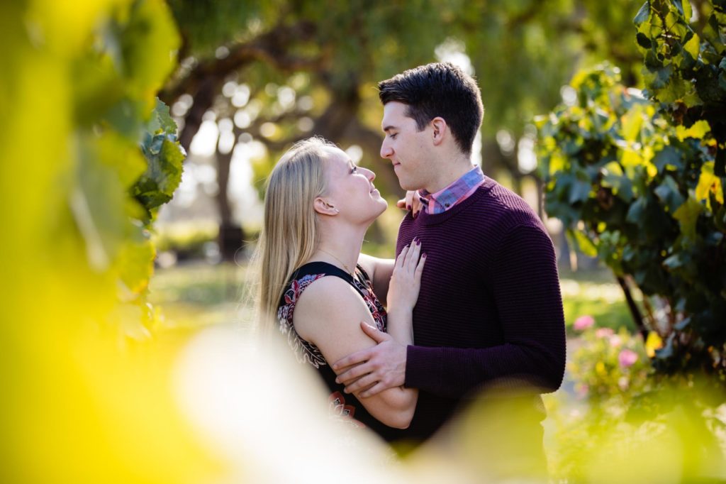 couple at vineyard engagement session