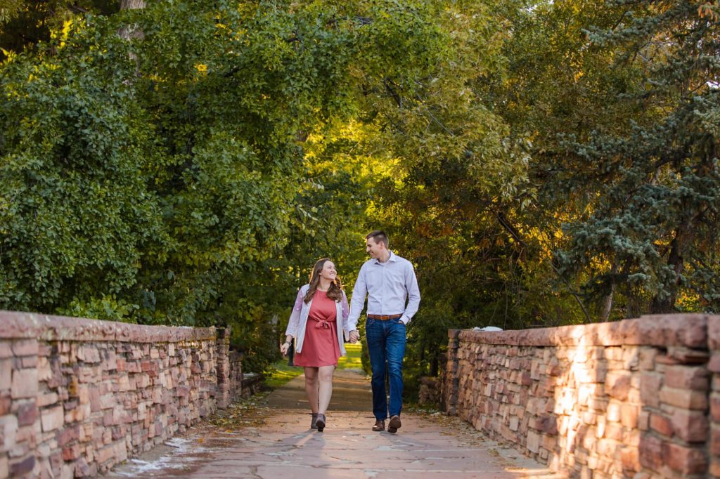 Colorado couple walks towards engagement photographer