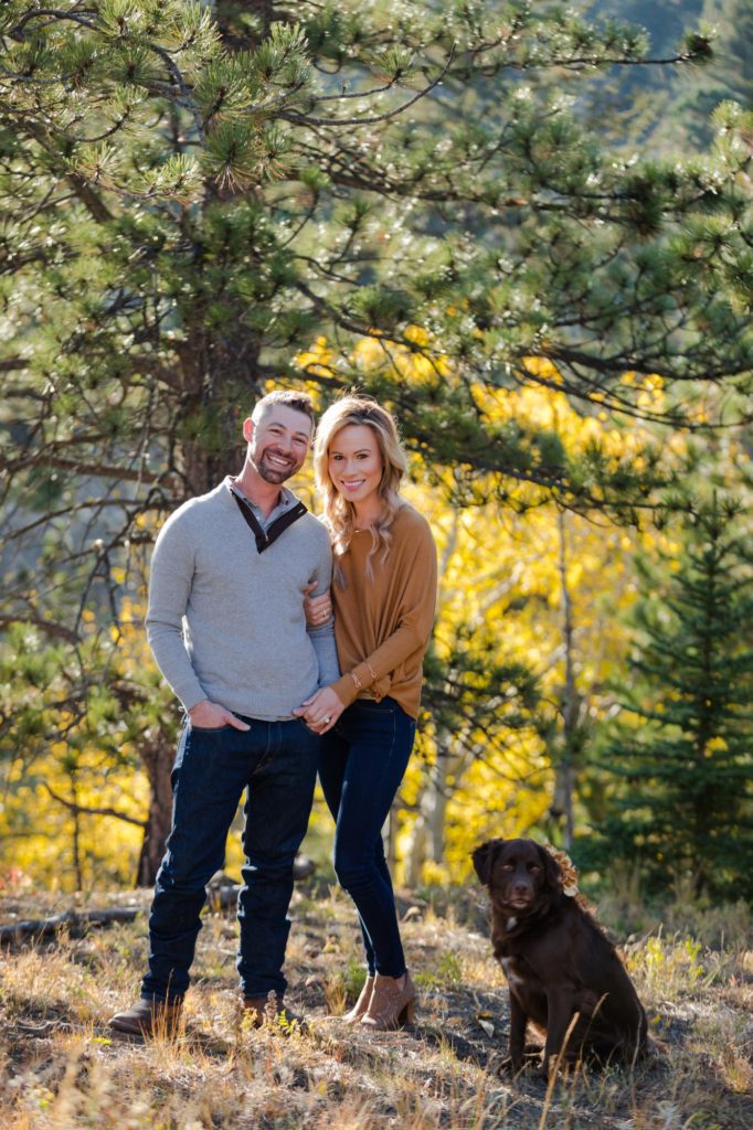 Colorado couple pose with their dog for engagement photos