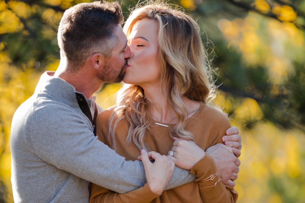 Colorado couple kiss for engagement photos