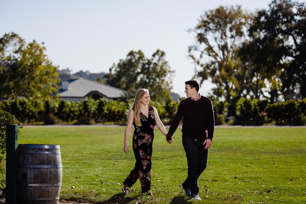 engaged couple in winery