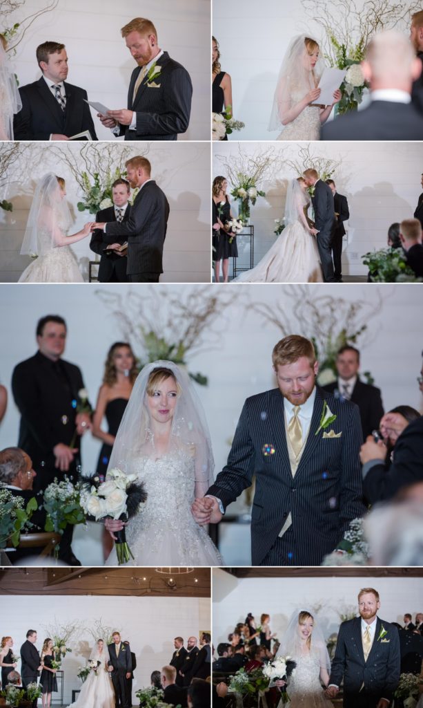 newlywed couple walks down aisle at indoor reception