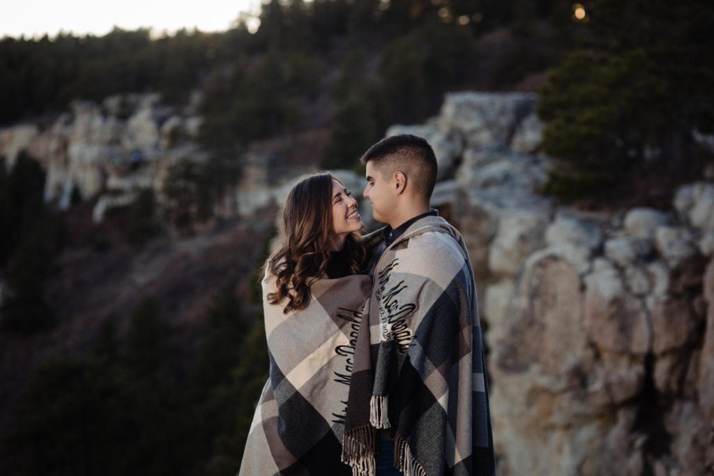 Colorado Springs couple pose for mountain engagement photos