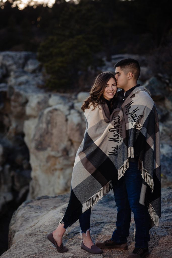 Colorado Springs couple pose for mountain engagement photographer