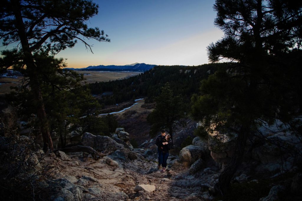 Colorado couple pose for mountain engagement photographer