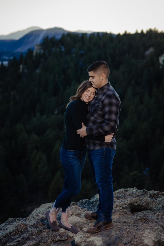 Colorado couple pose for mountain engagement photos