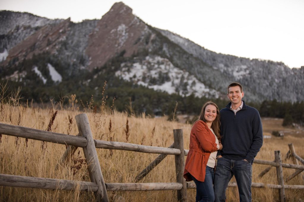 Boulder couple in front of Flatirons