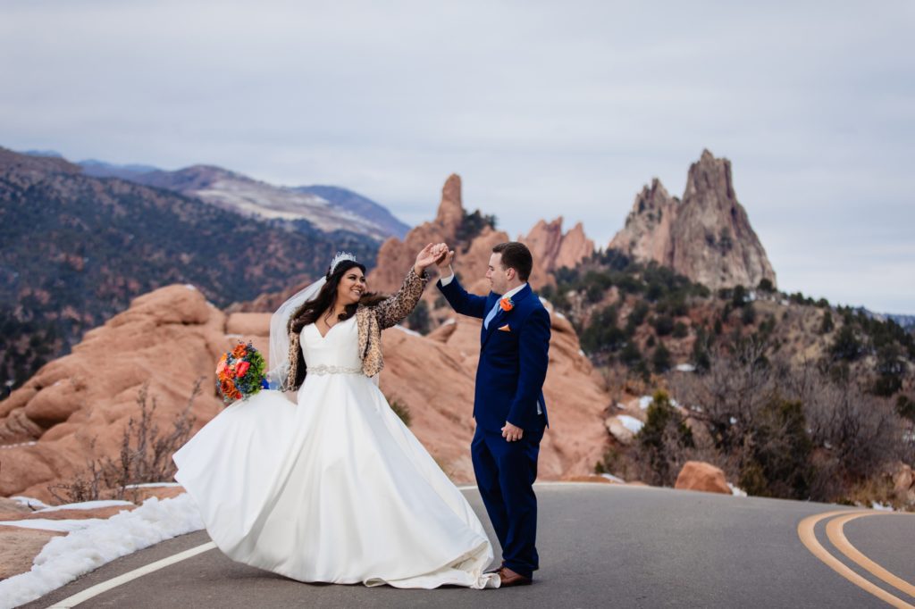 Texas couple in front of red rocks at Garden of the Gods