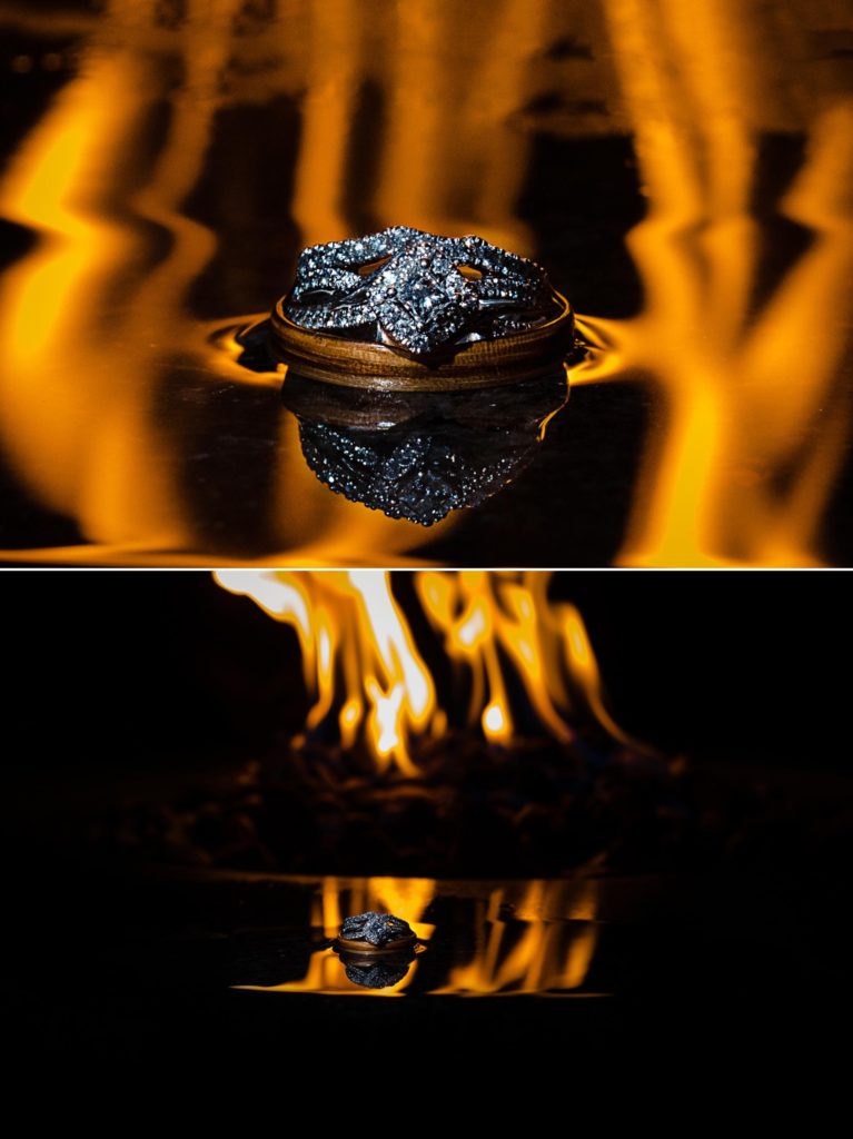 wedding rings in front of fire