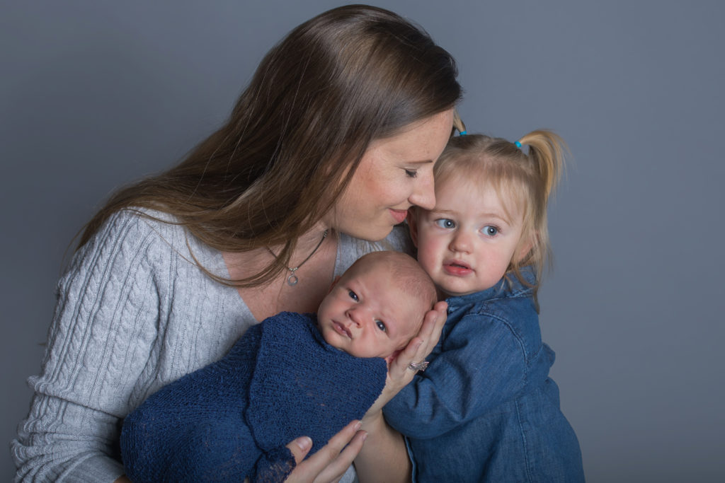 Mother and sister with Colorado baby boy