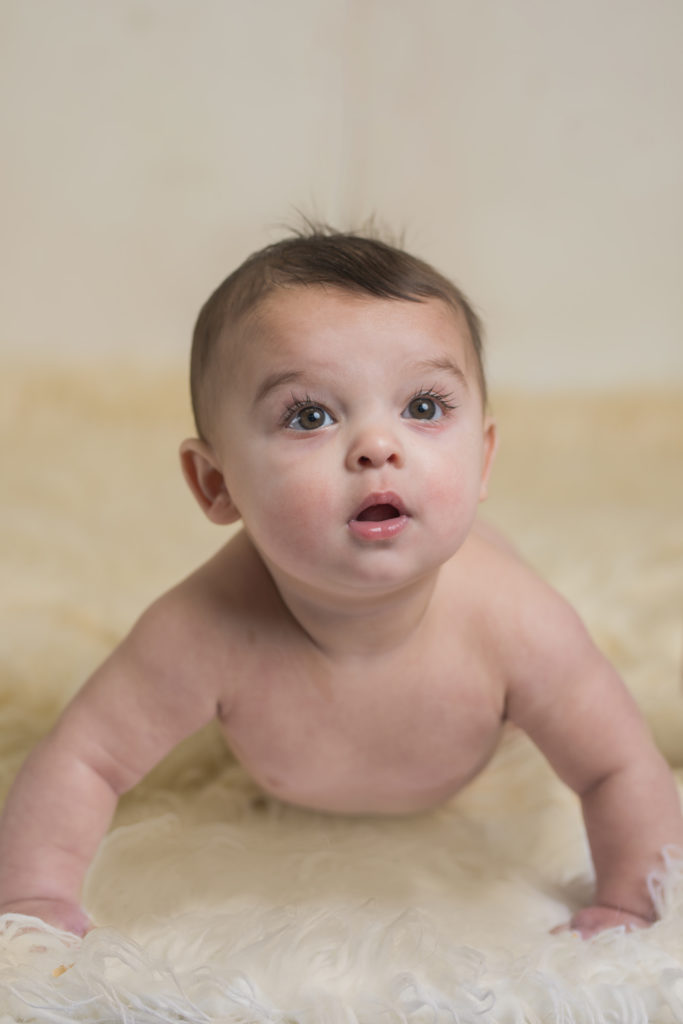 Colorado Springs baby poses for children's photographer