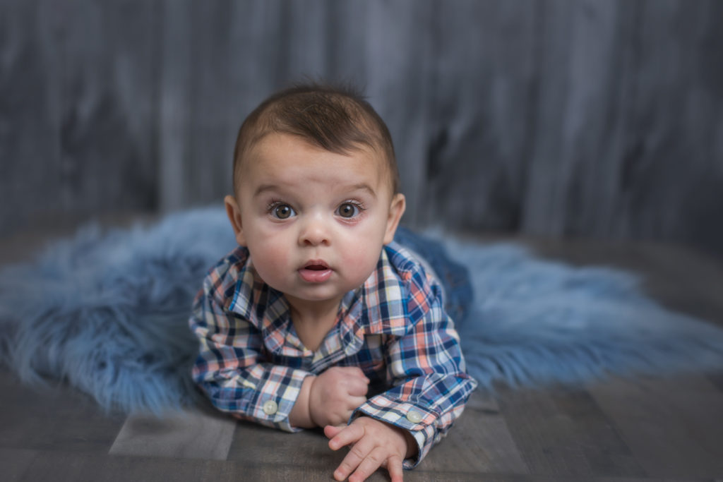 Larkspur baby poses for children's photographer