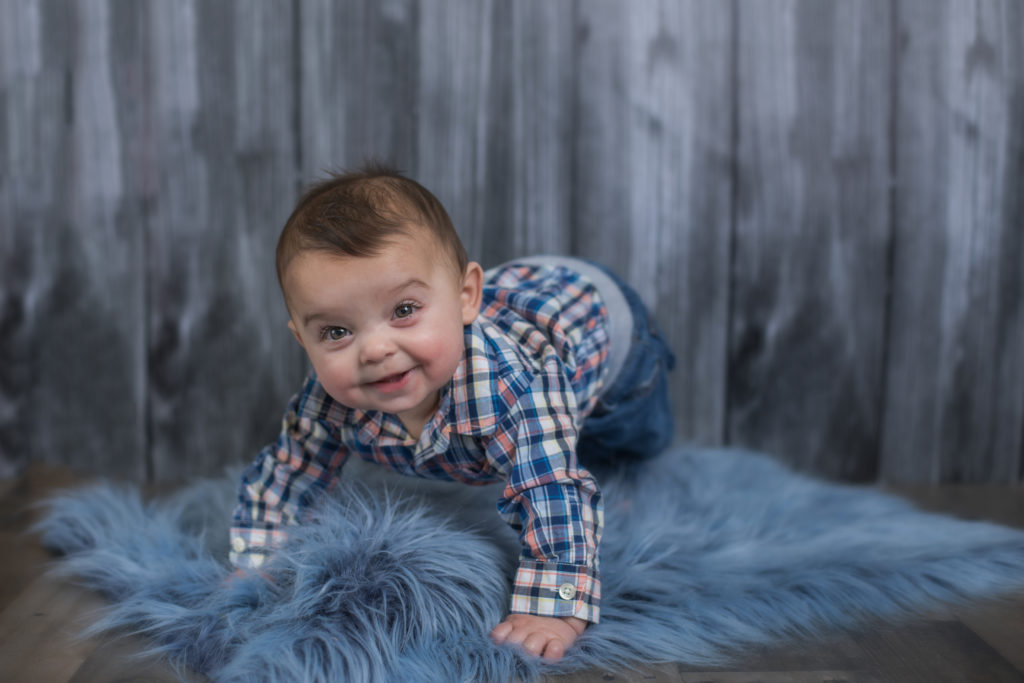 Larkspur baby poses for baby photographer