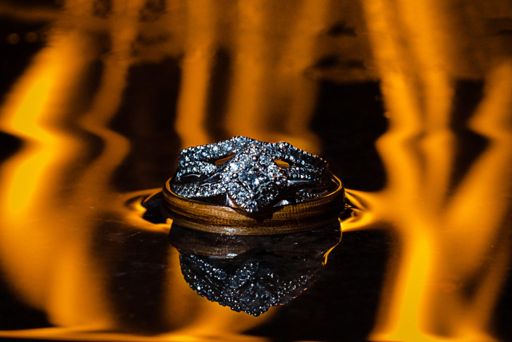 wedding rings surrounded by fire