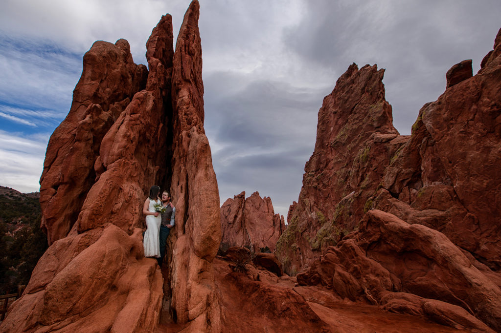 bride and groom at three graces garden of the gods