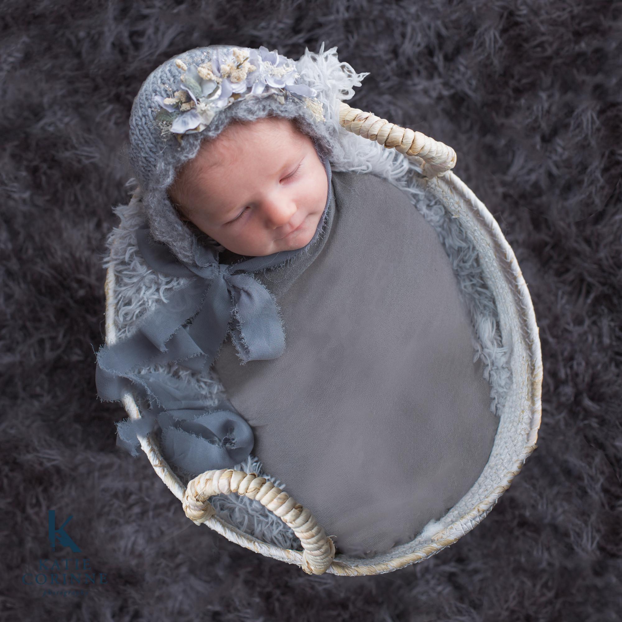 Baby posed for Black forest newborn photographer