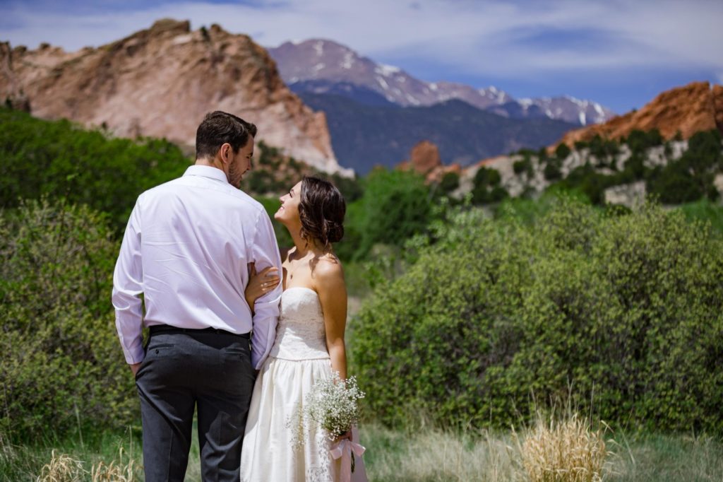 couple take mountain wedding photos