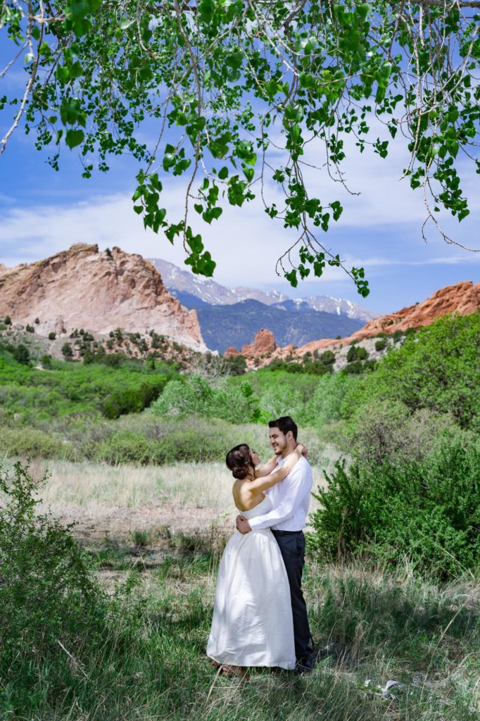couple take mountain elopement photos