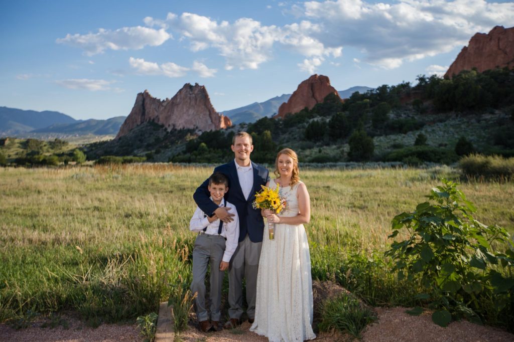 couple with kid elopes at Garden of the Gods