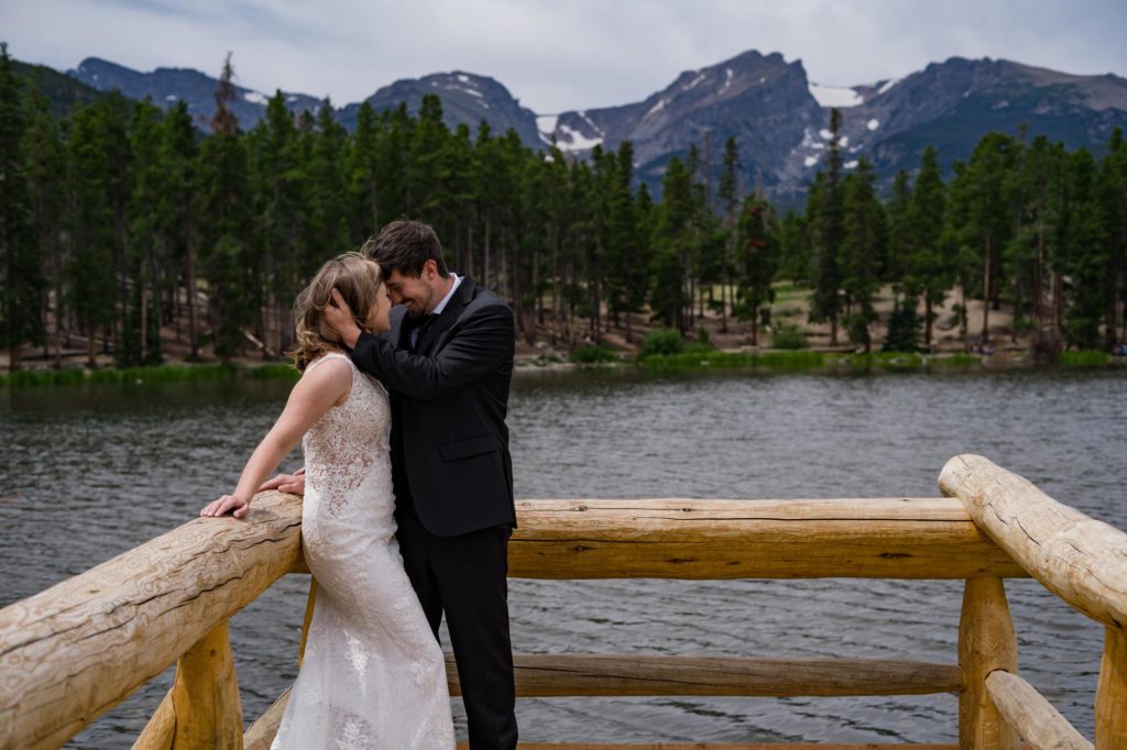 couple elopes on mountain lake