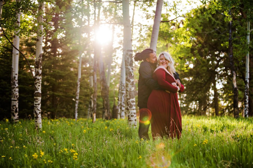 colorado couple at mountain wildflower engagement session