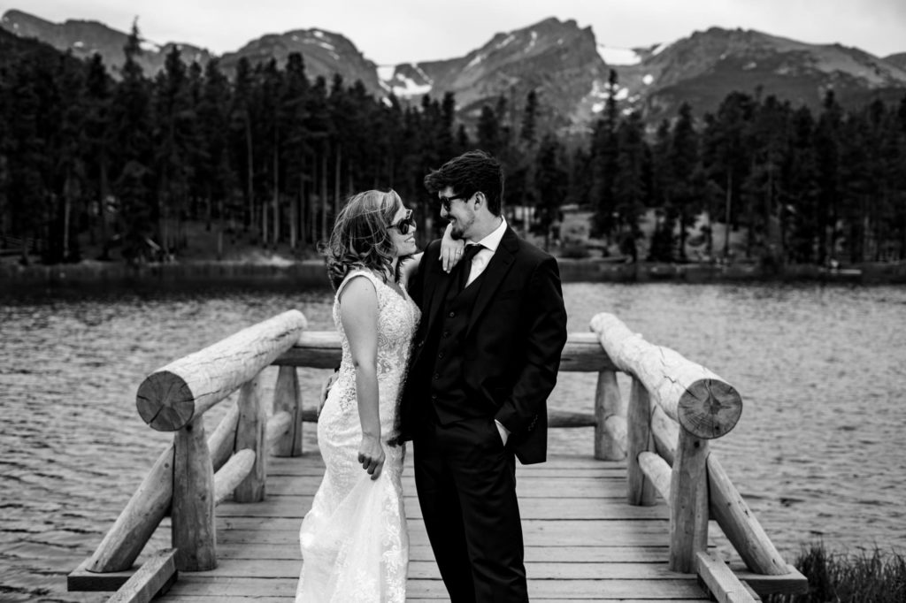 bride and groom elope on mountain lake