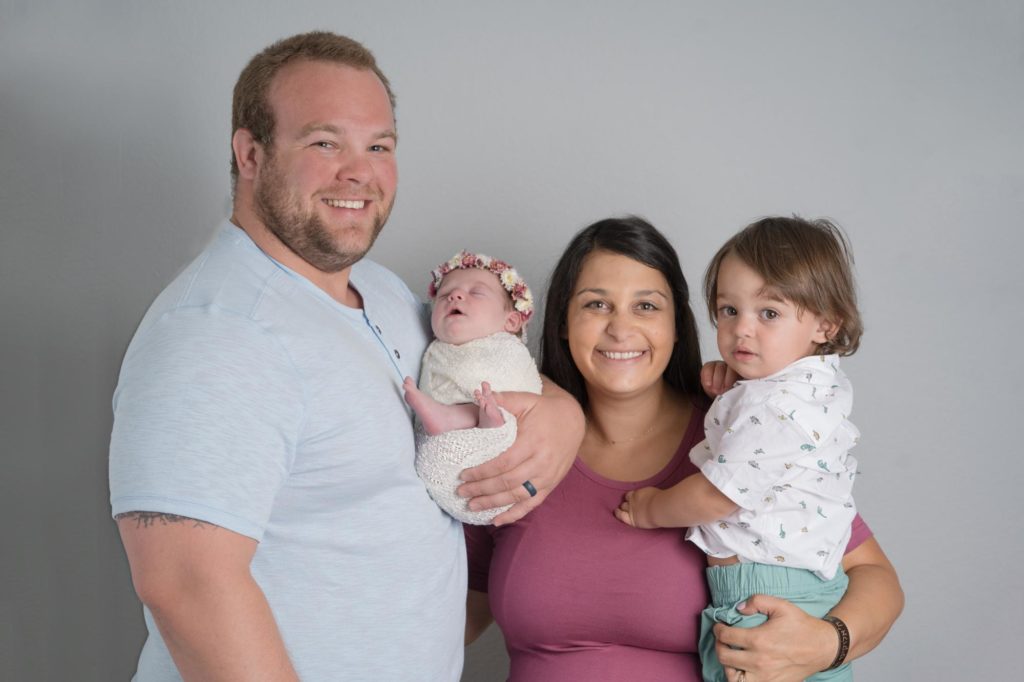 police officer family with newborn and toddler