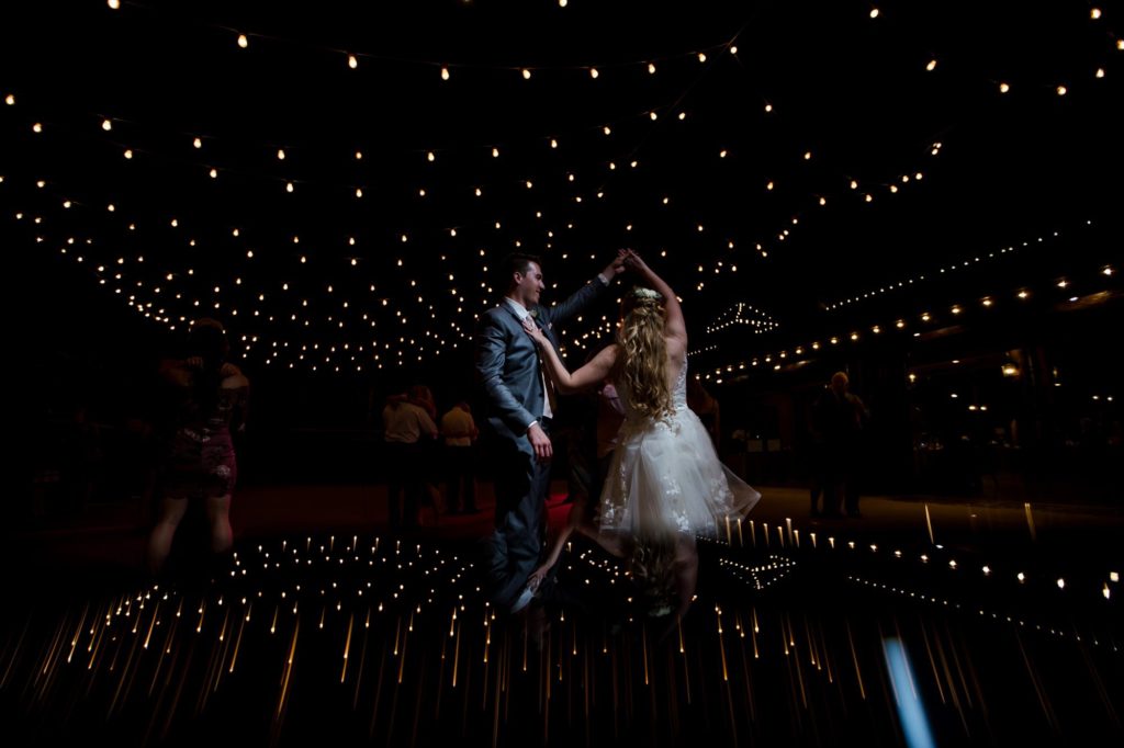 bride and groom dance at fall ranch wedding