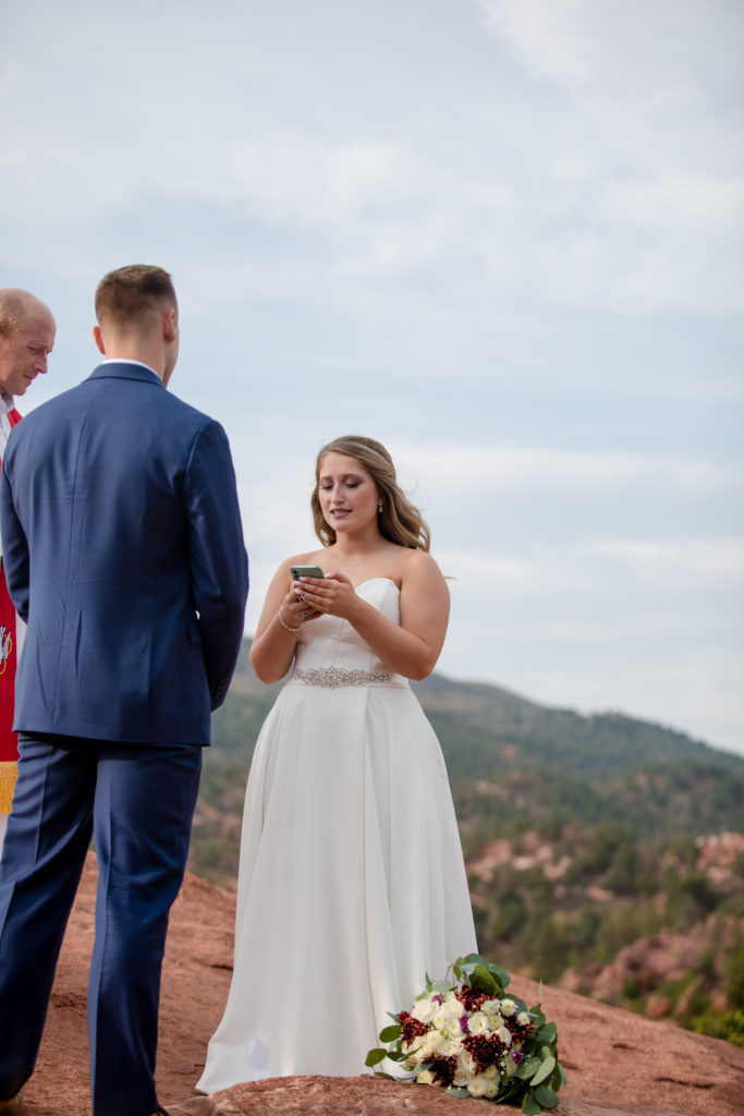 bride recites vows at Colorado wedding