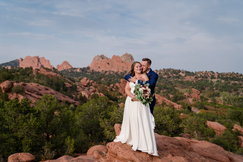 Colorado Springs couple hold each other after Christian elopement