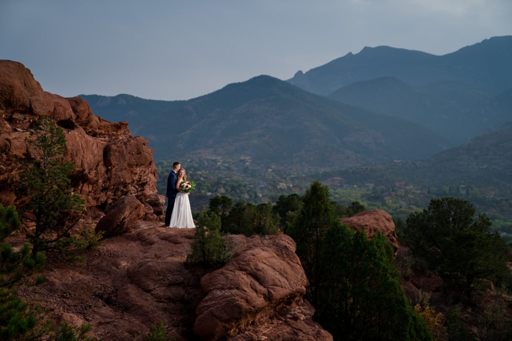 Colorado Springs Newlyweds in front of Rocky Mountains