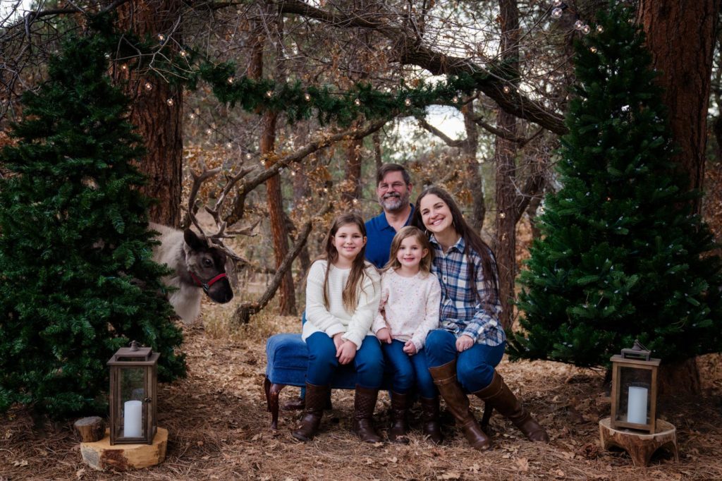 Colorado Springs family poses for reideer holiday photo session