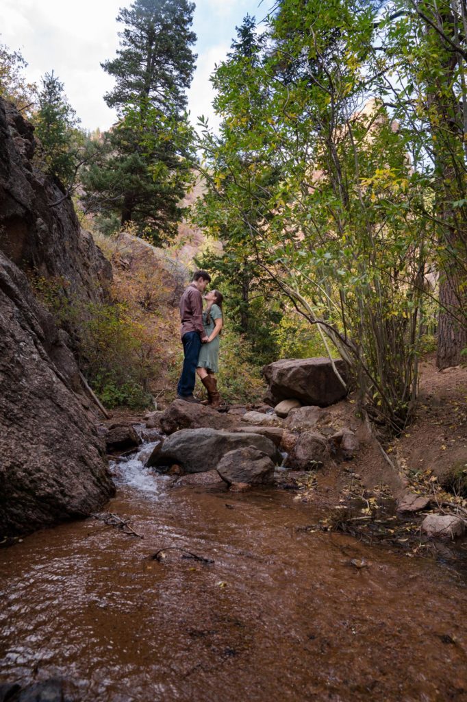 Colorado couple pose for Cheyenne Canon Engagement photographer