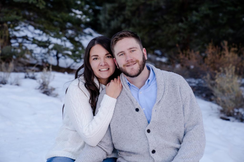 Colorado couple looks at winter engagement photographer
