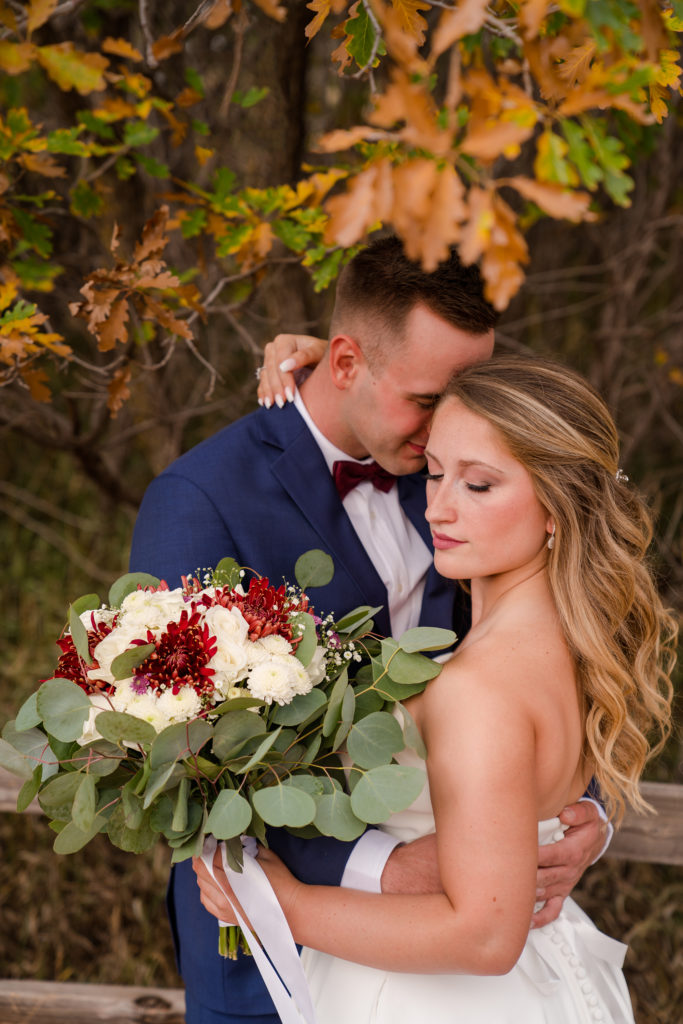 fall colors with bride and groom at Garden of the Gods