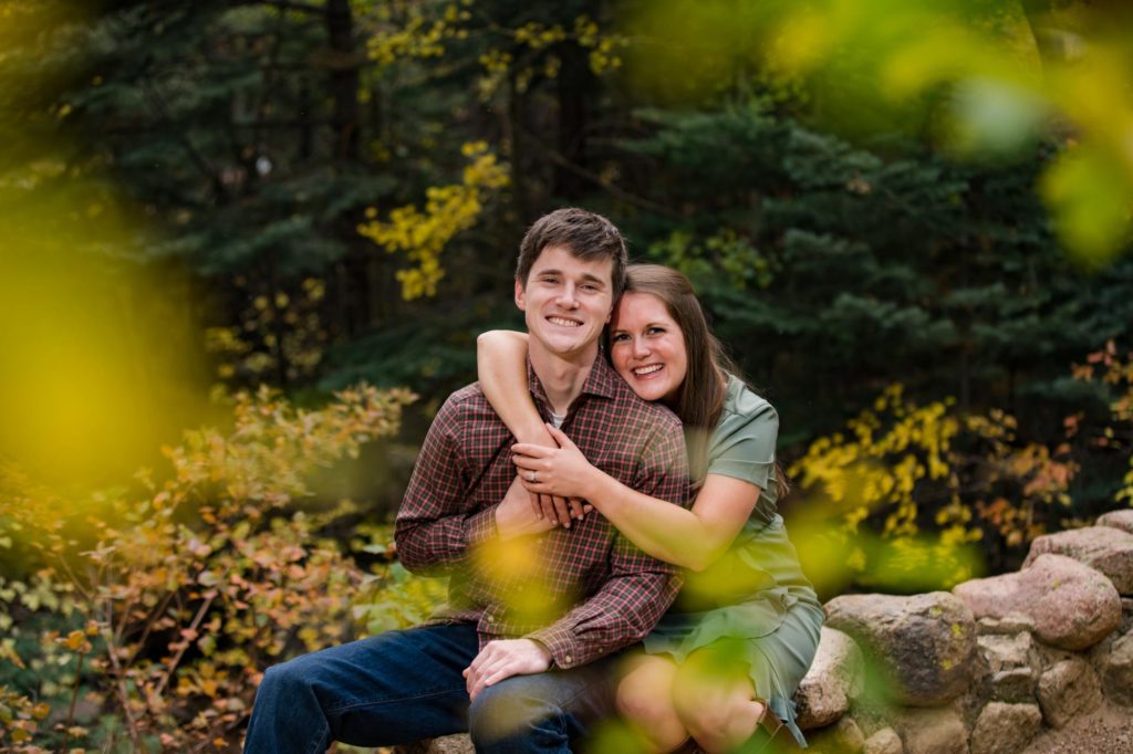 Colorado couple embrace in the fall
