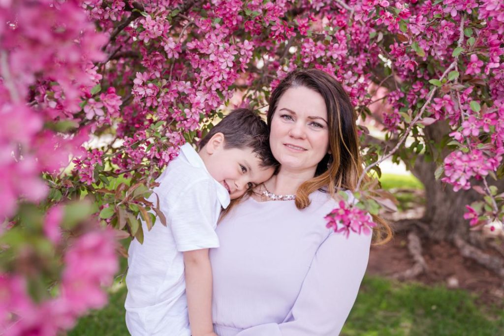Spring Family Portraits with blossoming flowers
