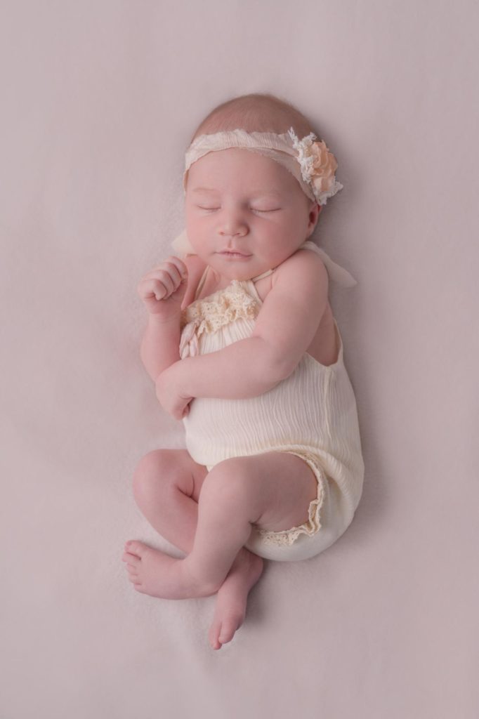 newborn baby photographed by professional