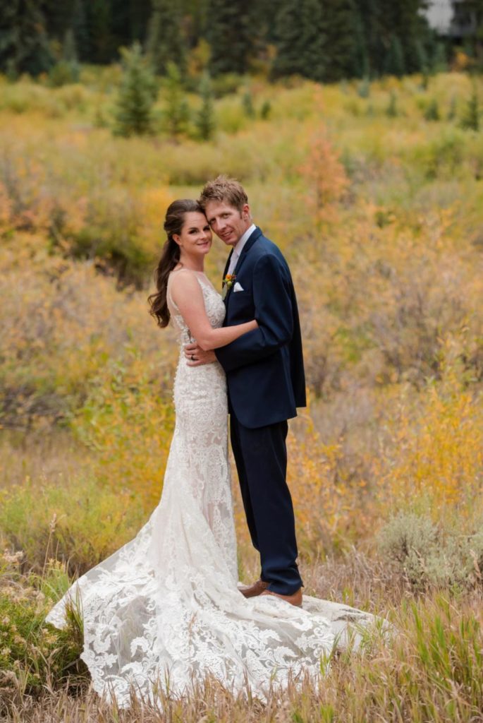 newly married bride and groom photographed by Colorado Mountain Wedding Photographer