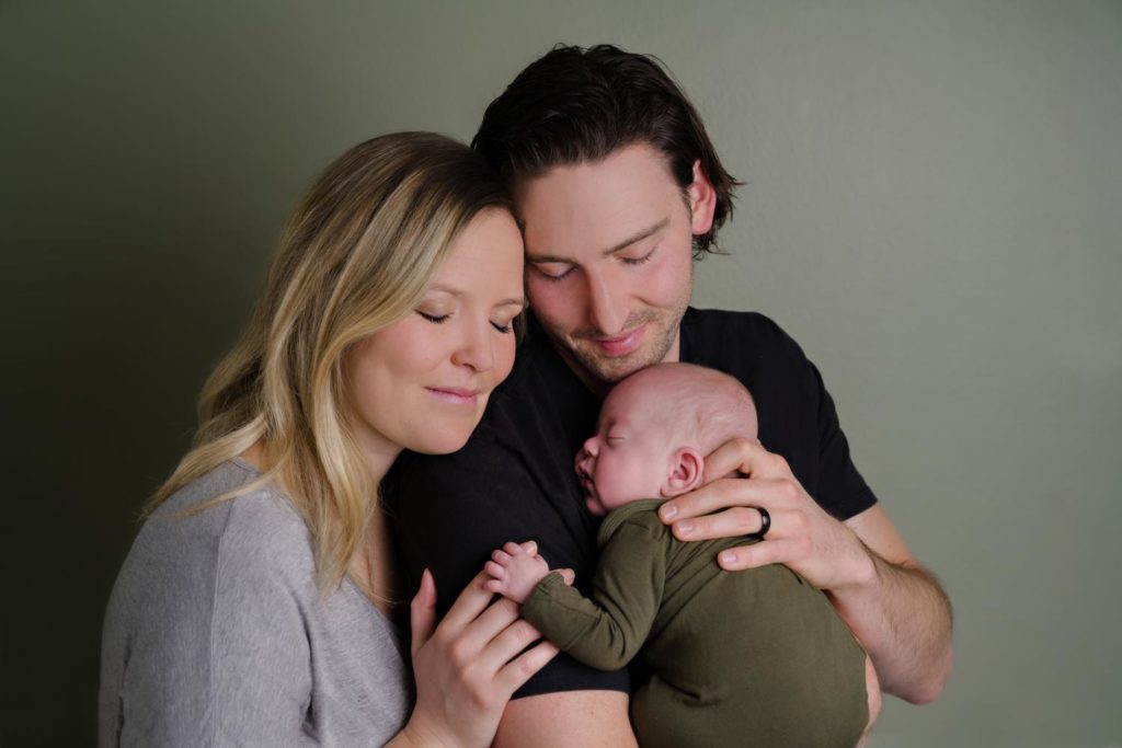 Couple holds their NICU baby