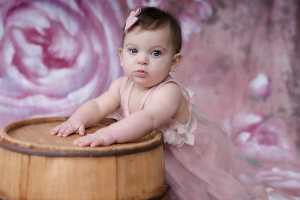 colorado springs baby girl poses at colorado milestone sessions
