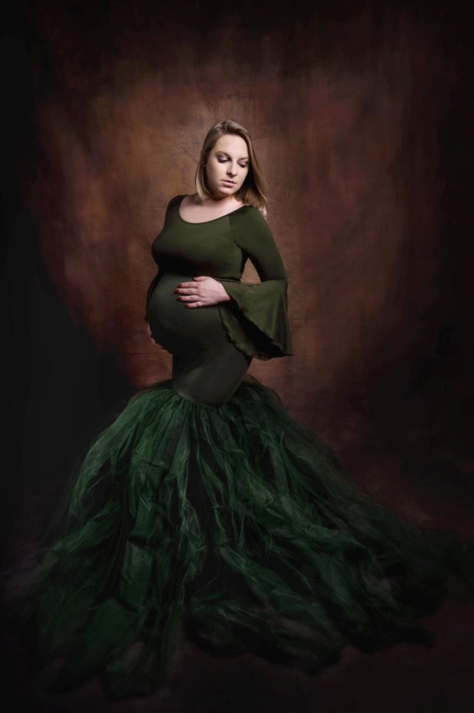 Pregnant woman at Colorado portrait studio