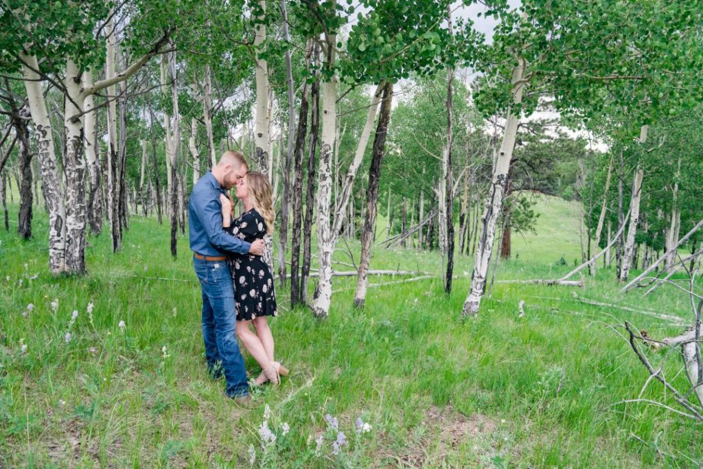 engaged couple takes portraits in colorado