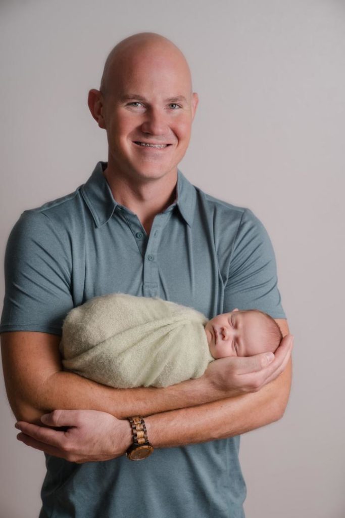 Colorado Springs father with newborn baby