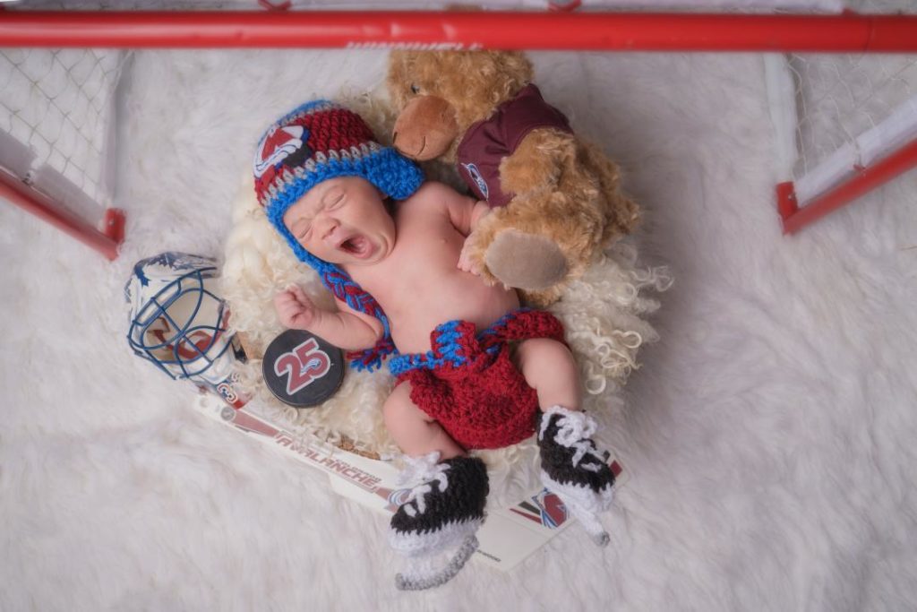 Avalanch hockey themed newborn portraits