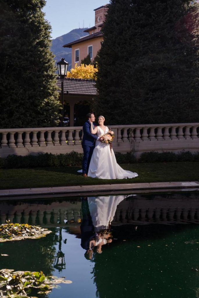 couple near pond at the Broadmoor
