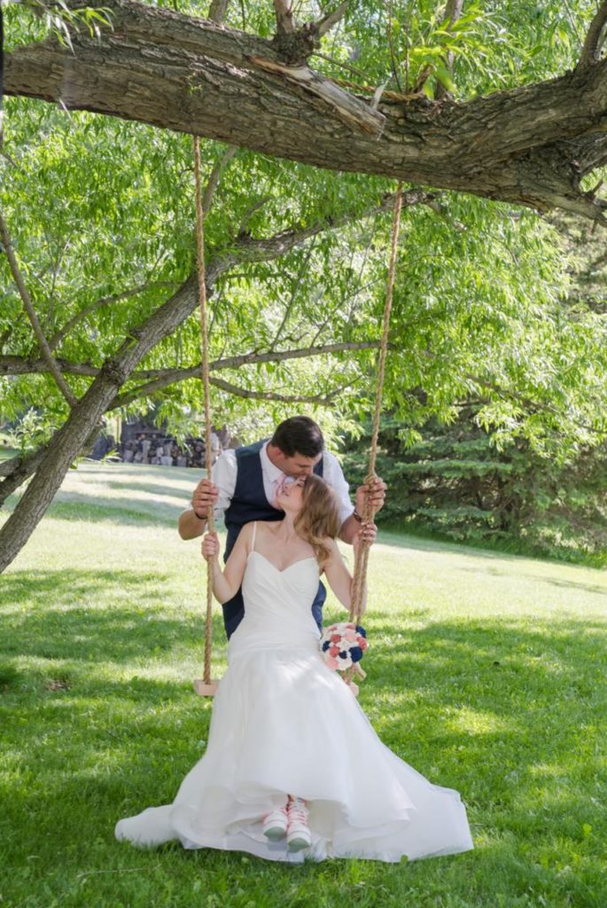 Swing bride and groom wedding photos at Running Creek Manor